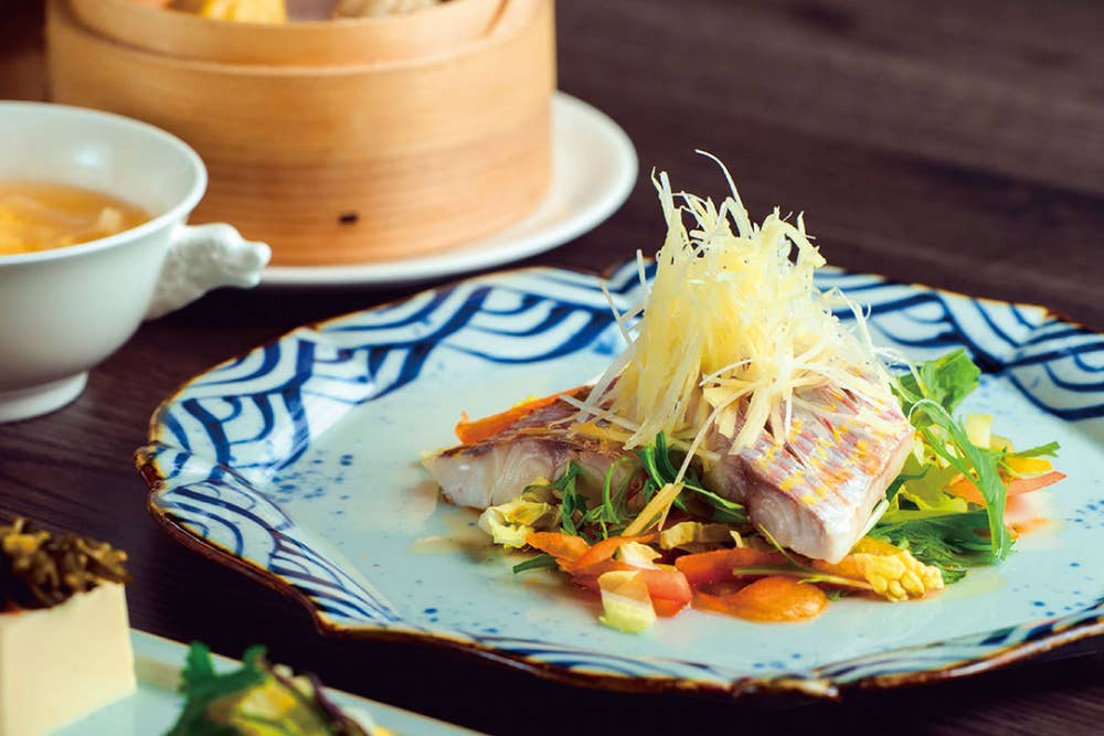 An example of Chinese cuisine consisting of one soup and three side dishes.